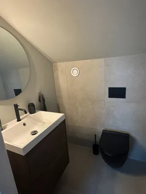 Badrumsrenovering Kalmar - Modern väggmonterad toalett av NBOS AB